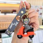 Unyks Star Cartoon Keychains for Girls & Boys – Cute Silicone Keyring Accessories for Kids, Fun Charms for Backpack, Purse, Car – Kawaii Key Holder Gift for Birthday (Tom Scooty Red)